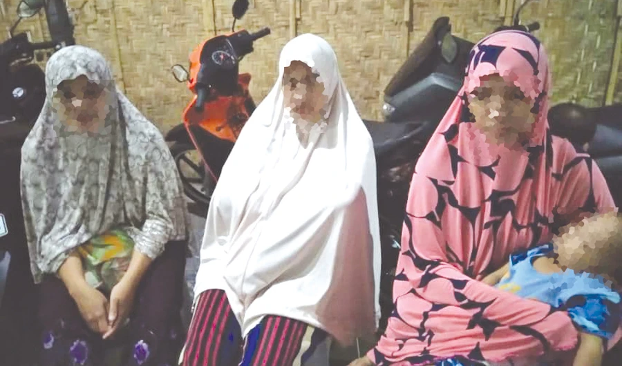 Three daughters of a militant group leader killed last year were among those held. (Supplied)