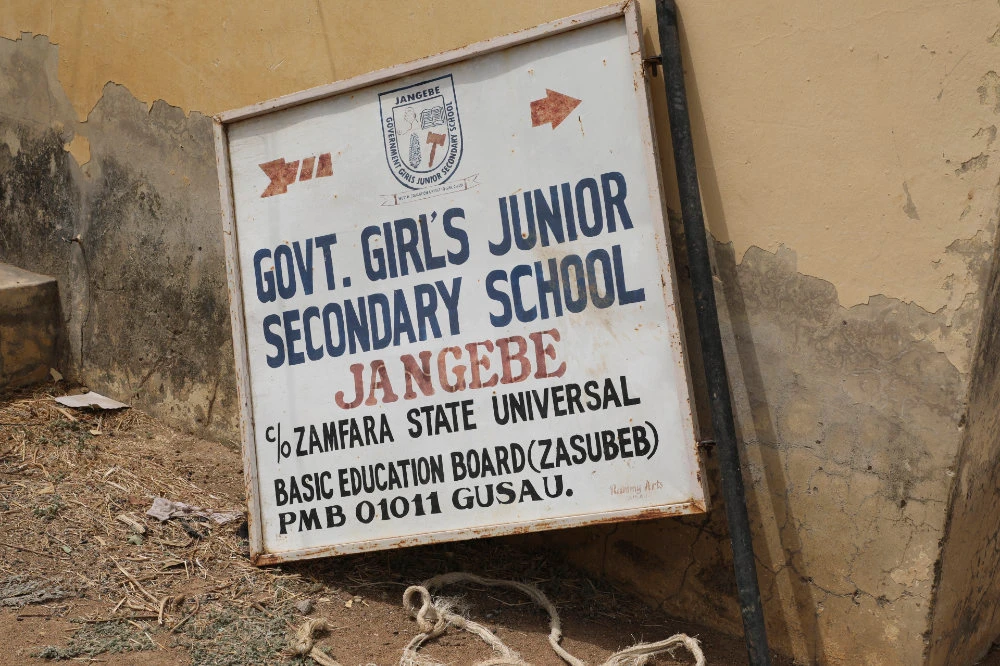 Sign post of the Government Girls Junior Secondary School in Jangebe, Nigeria, which was attacked by gunmen on Feb. 25, 2021. (AP Photo/ Ibrahim Mansur)