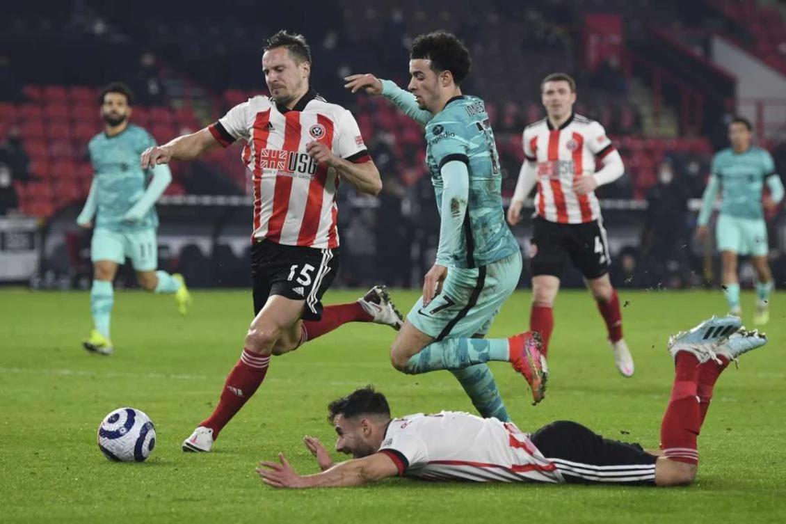 Liverpool beats Sheffield United 2-0 to end EPL losing run