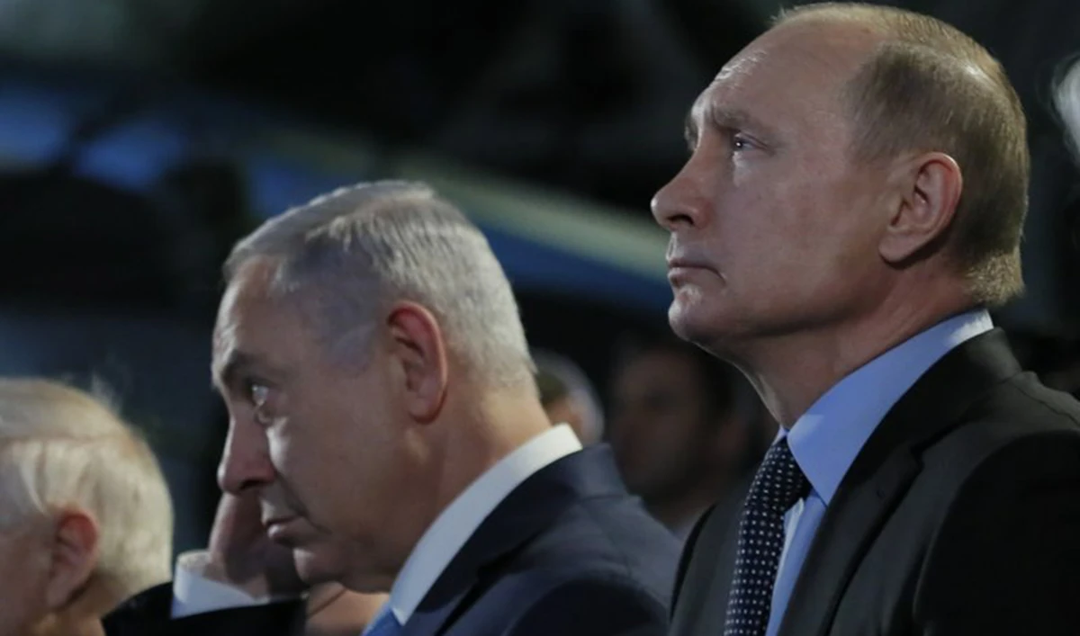 Israeli Prime Minister Benjamin Netanyahu and Russian President Vladimir Putin, right, attend a meeting. (AP/File)