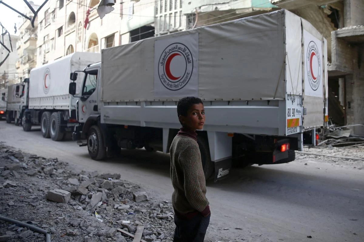 A Red Crescent aid convoy in Douma, March 2018. (Reuters)