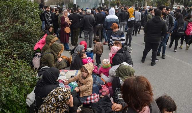 In this file photo, Syrian refugees prepare to board buses in Istanbul, Turkey, on the way to the Greek border. Turkey’s geopolitical position between Europe, the Middle East, Central Asia, and the Caucasus makes it indispensable to the EU. (AFP file)