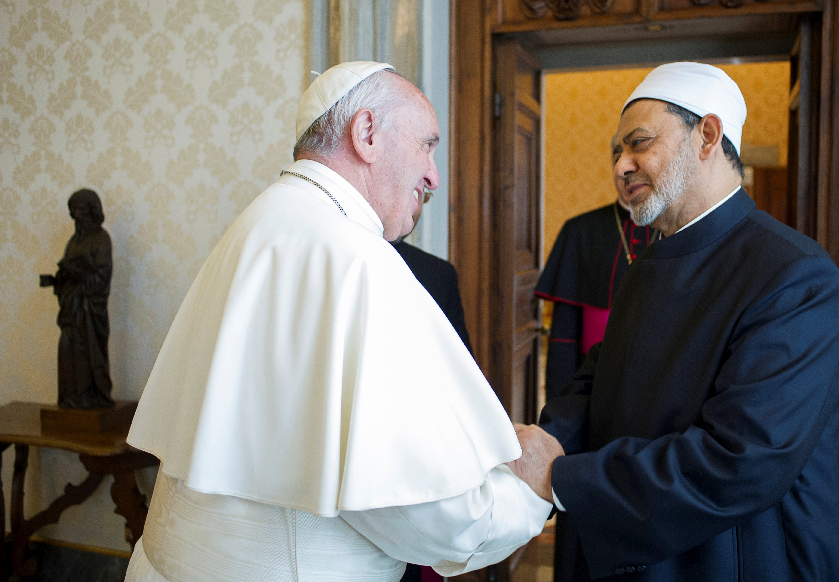 Pope Francis greets the Grand Imam of Al-Azhar at the Vatican, in 2016. (Reuters)