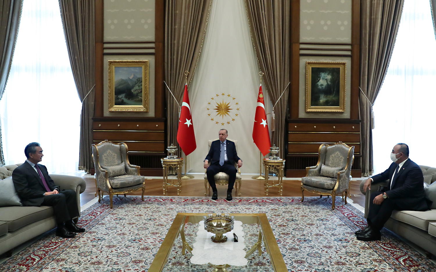 Turkish President Tayyip Erdogan, Foreign Minister Mevlut Cavusoglu and China's State Councilor and Foreign Minister Wang Yi meet at the Presidential Palace in Ankara, Turkey, March 25, 2021. (Reuters)
