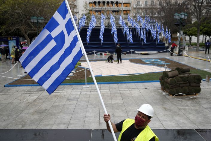 The national flag is positioned ahead of bicentennial celebrations, Athens, Greece, March 23, 2021. (AP Photo)