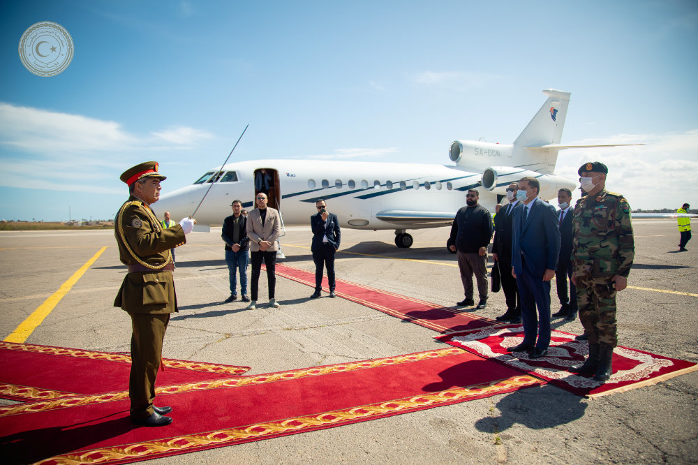 Libya's Prime Minister Abdulhamid Dbeibeh is welcomed upon his arrival in Tripoli, Libya on March 11, 2021. (Libyan PM's office via REUTERS)