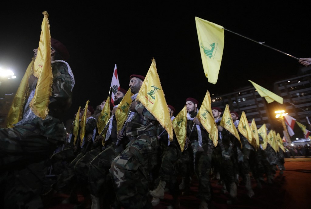 Fighters with the Lebanese Shiite Hezbollah party parade in Beirut. (File/AFP)