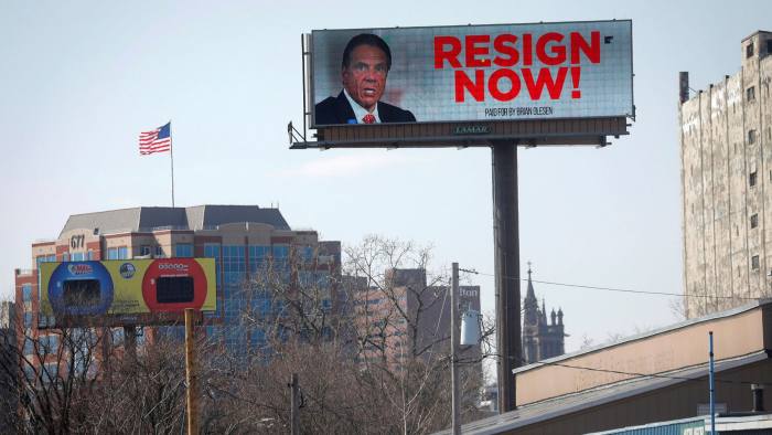 An electronic billboard in Albany, New York, displays a message that reads ‘Resign Now’ next to an image of Governor Andrew Cuomo. (Reuters)