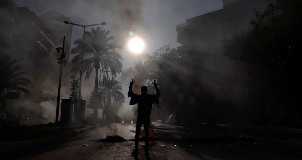 Angry protesters have been taking to the streets in Beirut neighborhoods. (AP)