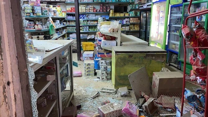 Shattered glass and scattered groceries lay in a grocery shop after an attack in Jazan region of southwestern Saudi Arabia on March 2, 2021. (SPA)