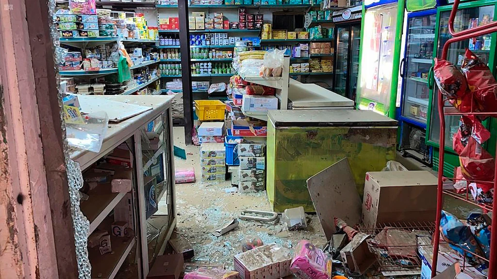This photo released by Saudi Press Agency shows the damage on a grocery shop in Jazan, Saudi Arabia, after a military projectile launched by Houthis fell early Tuesday, March 2, 2021. (AP)