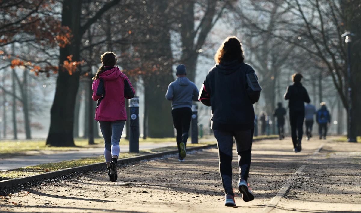 Joggers run at the Volkspark Friedrichshain, amid the coronavirus disease (COVID-19) pandemic, in Berlin, Germany March 2, 2021. (Reuters)