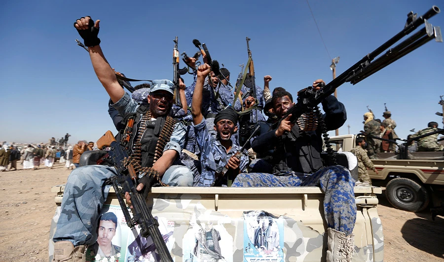 Houthi fighters chant slogans as they ride a military vehicle in the capital Sanaa to mobilize more fighters in several Yemeni cities, on January 3, 2017. (AFP)