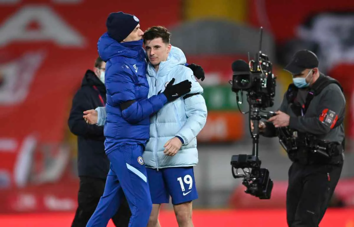 Chelsea's head coach Thomas Tuchel, left, celebrates with player Mason Mount after winning the English Premier League soccer match between Liverpool and Chelsea on March 4, 2021. (Laurence Griffiths, Pool via AP)