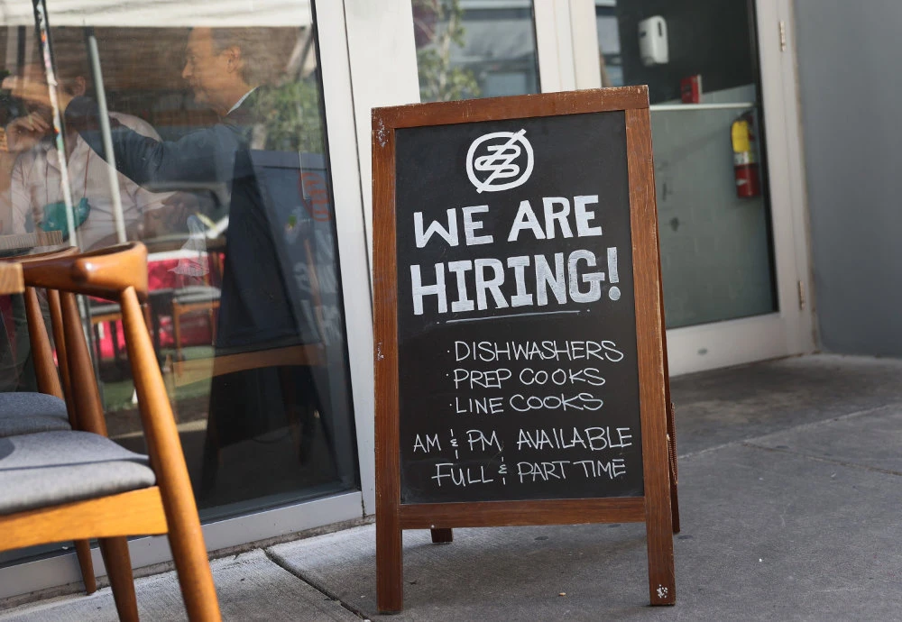 US hiring surges back in February, adding 379,000 jobs