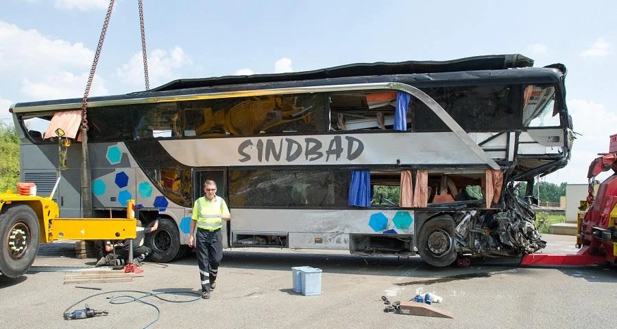 A crashed bus is made ready to be transported off the accident site on the A4 motorway linking Poland and Germany near the Neustadt district in Dresden, eastern Germany, on July 19, 2014. (File/AFP)