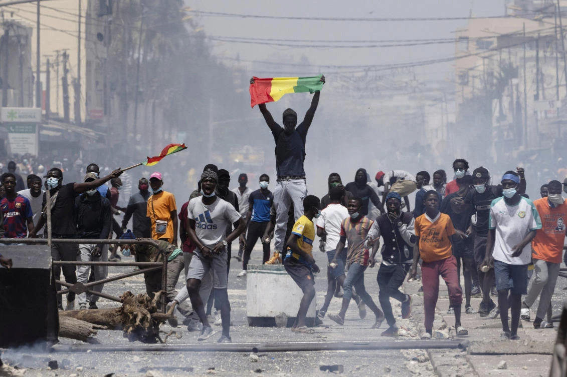 Rioters ransack police stations and buildings as Senegal opposition steps up protests