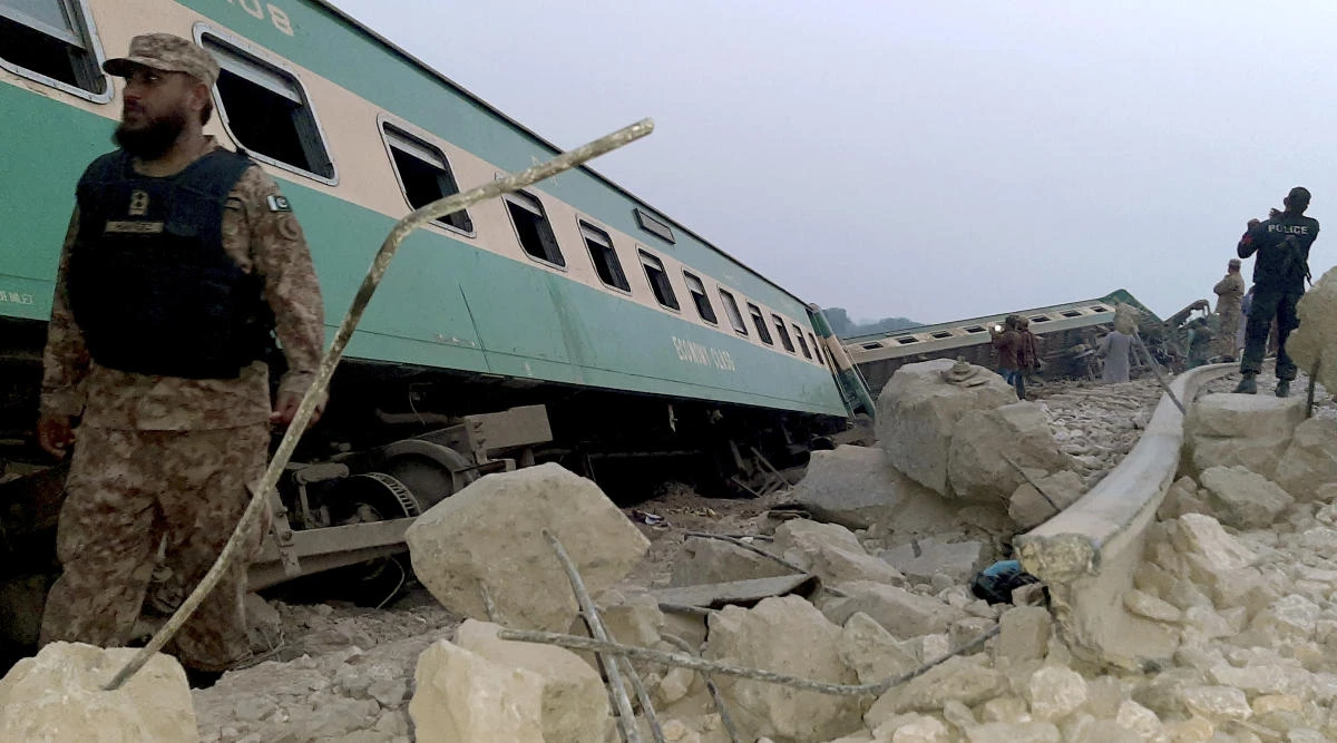 Army, police and rescue workers gather at the site of a derailed train in near Rohri, in southern Pakistan, Sunday, March 7, 2021. Eight cars of a Lahore bound train derailed in southern Pakistan early Sunday, killing and injuring some passengers, officials said. (AP)