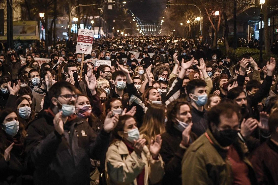 Thousands of people shout anti-government slogans and "no dead hunger striker" during another day of protests to support convicted operational leader of the far-left group "November 17", Dimitris Koufodinas who began a hunger strike on January 7 in the high security prison in central Greece to demand his transfer to Korydallos prison in Athens, near his family. (AFP)