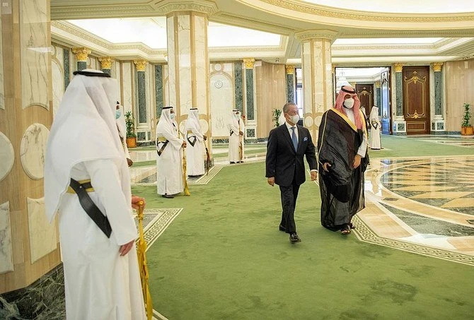 Saudi Arabia’s Crown Prince Mohammed bin Salman receives Malaysian Prime Minister Muhyiddin Yassin in Riyadh on Tuesday, March 9, 2021. (SPA)