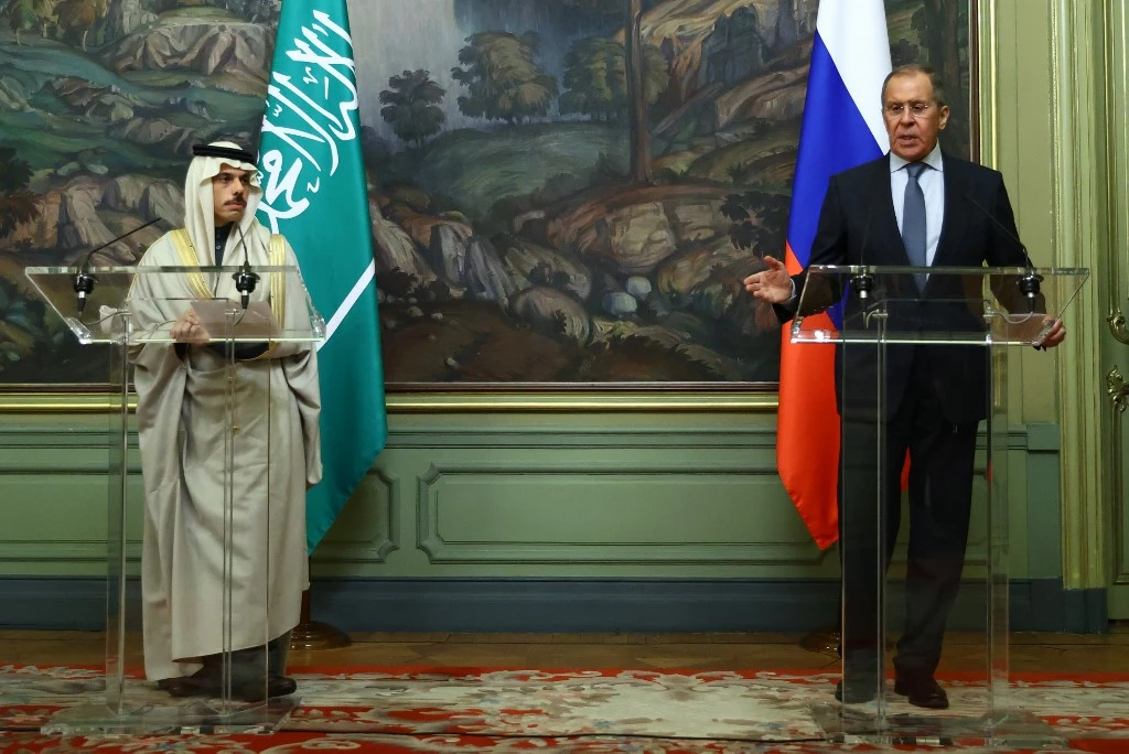 Russian Foreign Minister Sergey Lavrov and his Saudi counterpart Prince Faisal bin Farhan hold a joint press conference following their meeting in Moscow on Jan. 14, 2021. (File/AFP)