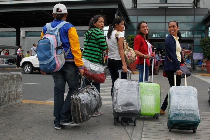 Filipinos celebrate end of decades-old kafala system in Saudi Arabia