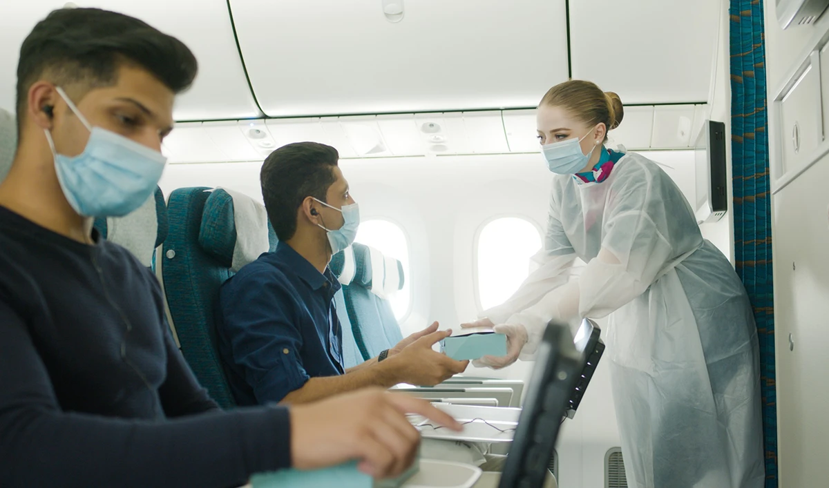 In the air, food and beverages continue to be offered in the form of bento-style boxes to reduce contact between guests and crew during meal service.