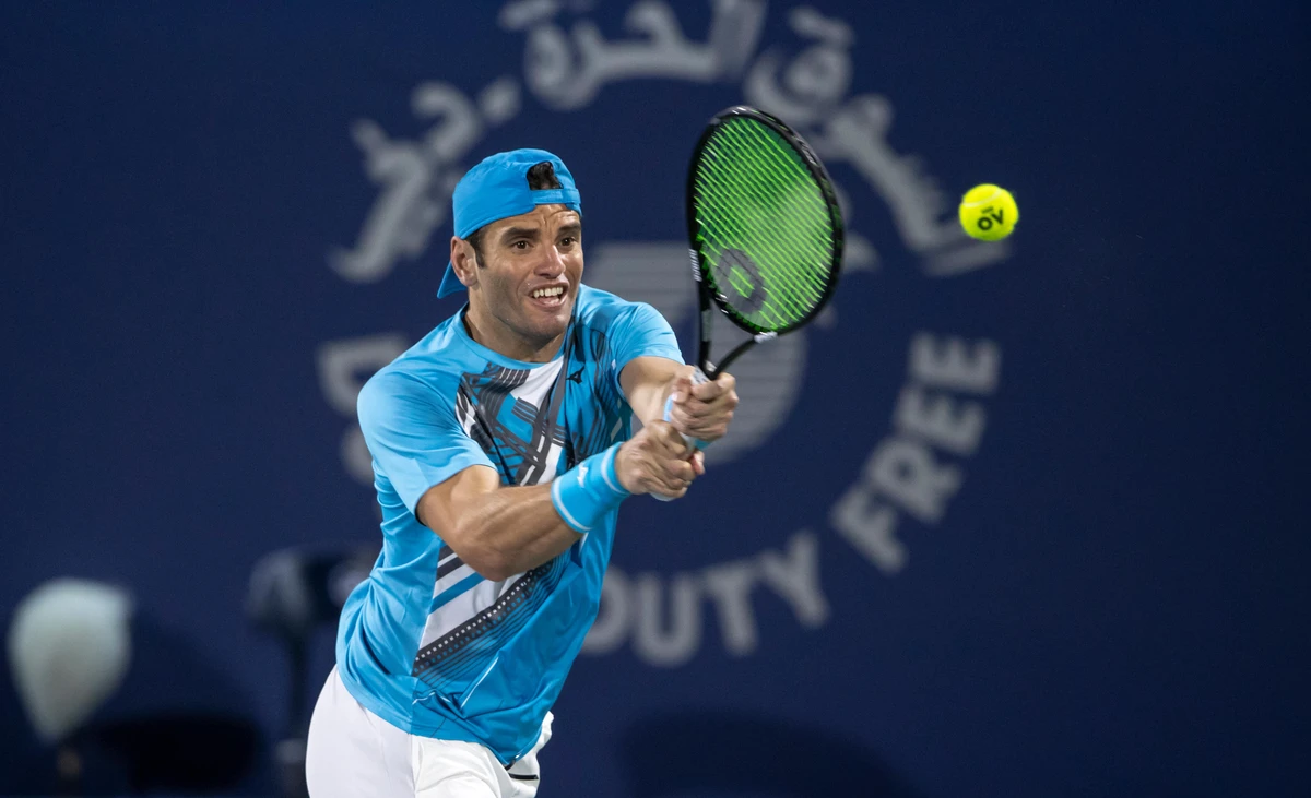 Malek Jaziri's 100th ATP Tour win sees him through to the second round of the Dubai Duty Free Tennis Championships. (ATP Tour)