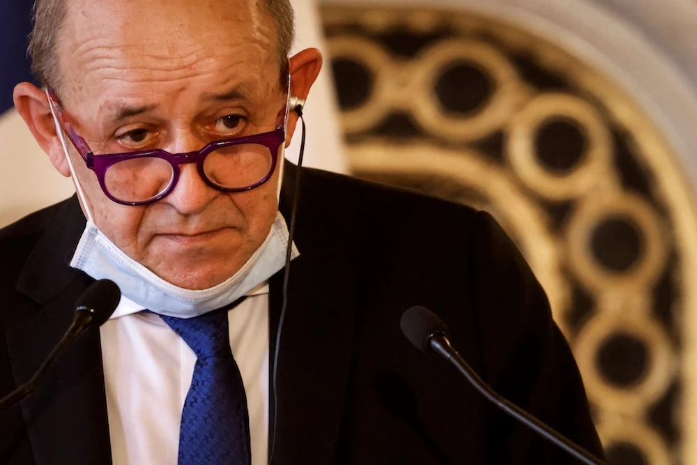 French Foreign Minister Jean-Yves Le Drian speaks during a joint press conference following a meeting on the Middle East Peace process, in Paris, on March 11, 2021. (AFP)