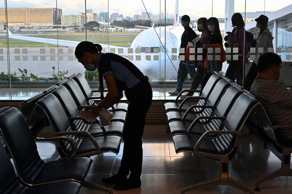 The ban on overseas arrivals by the Philippine government’s COVID-19 task force takes effect March 20. (AP)