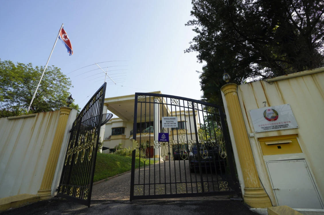 A North Korean flag flies by the entrance to the North Korean Embassy in Kuala Lumpur, Malaysia, on March 19, 2021. (AP Photo/Vincent Thian)