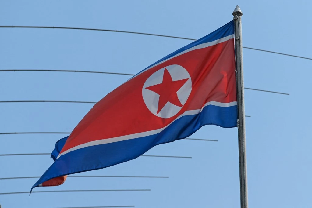 North Korean flag is seen in the country's embassy compounds in Kuala Lumpur on March 19, 2021, after North Korea severed diplomatic ties with Malaysia in response to the extradition of a citizen to the US earlier this month. (AFP)