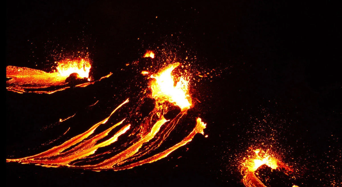 In this still image captured from a hand out video, lava flows from the erupting Fagradalsfjall volcano in Reykjavik on March 19, 2021. (Icelandic Coast Guard via AFP)