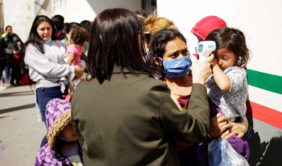 US to place some migrants in hotels