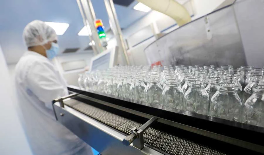 A lab technician works on investigational coronavirus disease (COVID-19) treatment drug "Remdesivir" at Eva Pharma Facility in Cairo, Egypt June 25, 2020. (REUTERS)