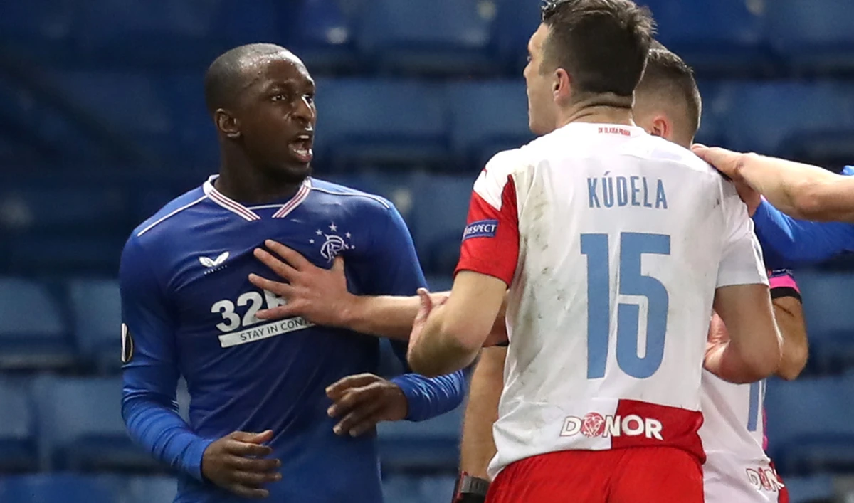 Slavia Prague's Ondrej Kudela clashes with Rangers' Glen Kamara during their match. (Reuters)