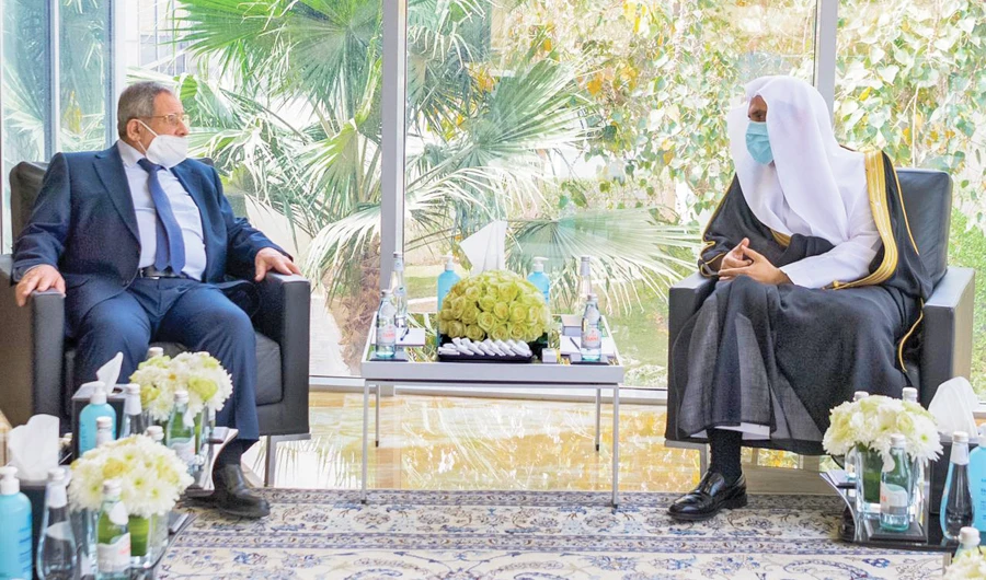 MWL chief Dr. Mohammad bin Abdulkarim Al-Issa hold talks with Dr. Ayman Idlibi. (Supplied)