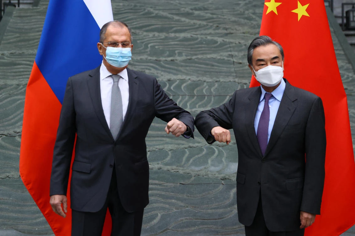 Russian Foreign Minister Sergei Lavrov meets with Chinese Foreign Minister Wang Yi in Guilin on March 22, 2021. (File/AFP)