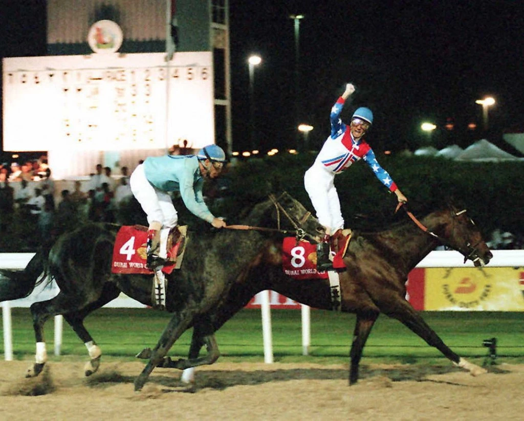 US jockey Jerry Bailey (R) riding "Cigar" celebrates on the finish line 27 March 1996 in Dubai after winning the Dubai World Cup. (AFP/File Photo)