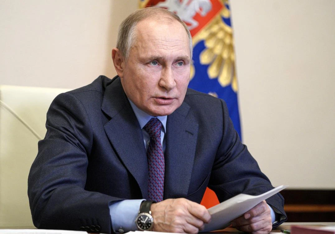 Russian President Vladimir Putin was vaccinated against the coronavirus on Tuesday and was feeling fine and planning a regular workday Wednesday according to his spokesman Dmitry Peskov (AP)