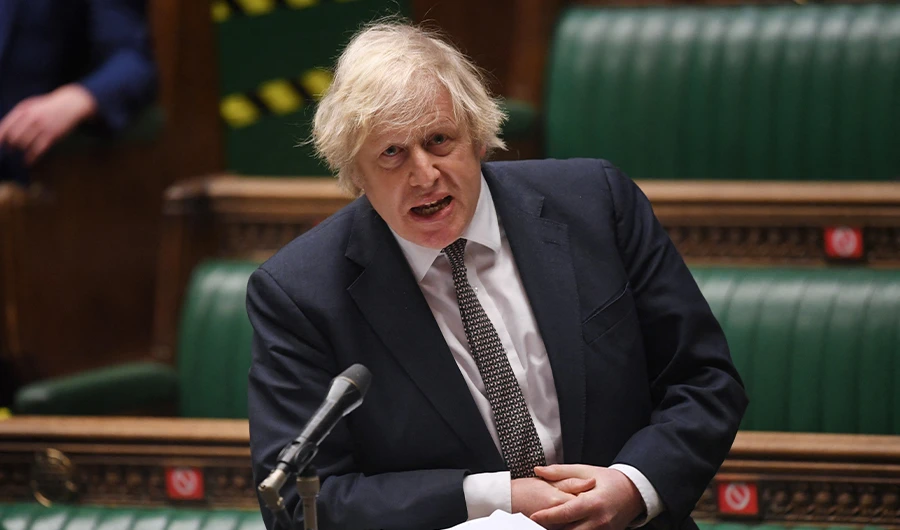 Britain's PM Boris Johnson attending Prime Minister's Questions in a socially distanced, hybrid session at the House of Commons, in central London on March 24, 2021. (AFP)