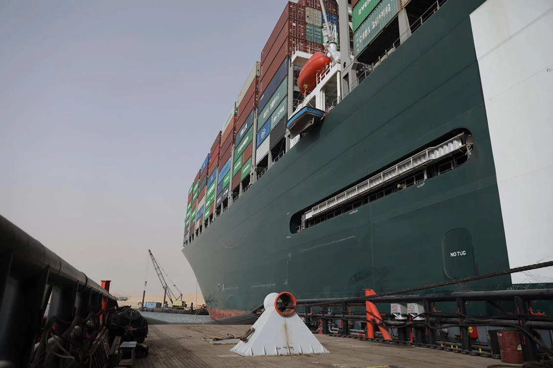 The Ever Given, a Panama-flagged cargo ship, is wedged across the Suez Canal, blocking traffic in the vital waterway. (AP)