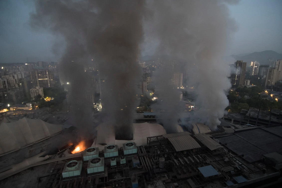 Smoke billows after a fire broke out at a coronavirus disease (COVID-19) hospital in Mumbai, India, March 26, 2021. (Reuters)