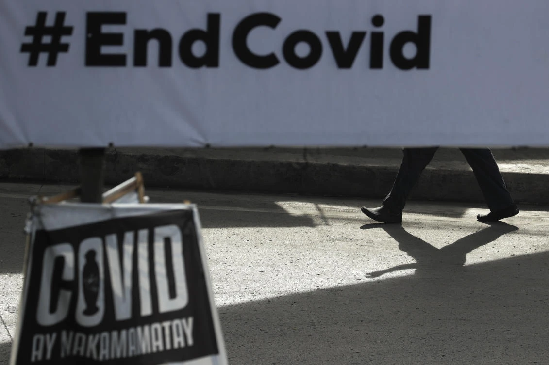 Coronavirus infections reported in the past 10 days accounted for a tenth of the Philippines’ total of 702,856 cases. (AP)