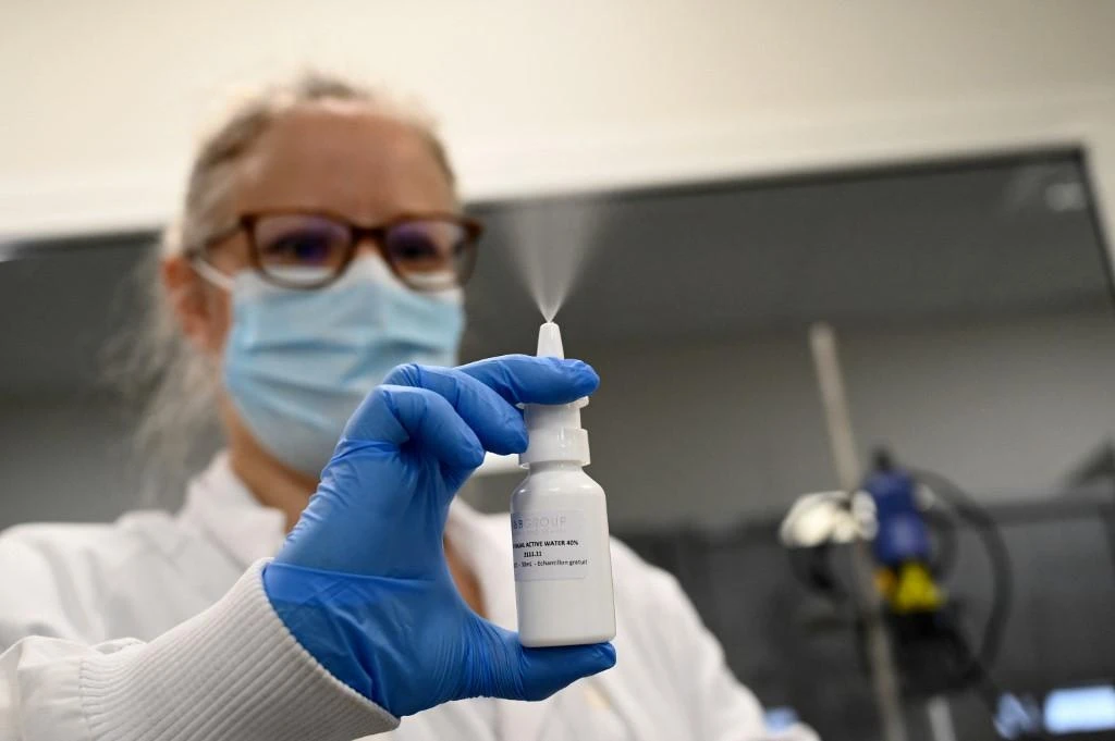 Scientists at Oxford University in the UK will test whether the AstraZeneca coronavirus vaccine can be administered through a nasal spray. (File/AFP)