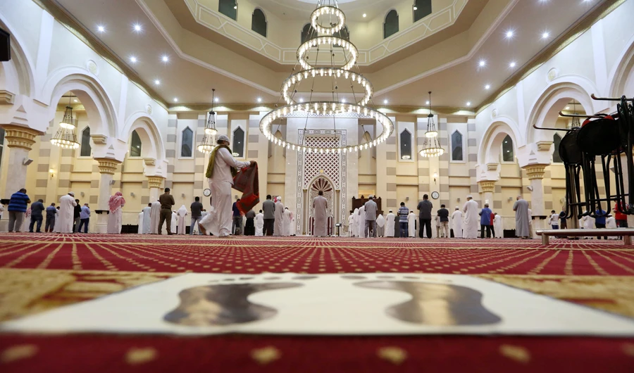 Worshippers gather for the dawn prayer at a mosque in the Saudi holy city of Makkah on June 21, 2020. (AFP)
