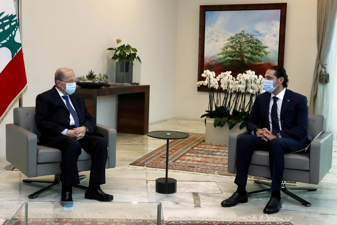 Lebanon's President Michel Aoun meets with Prime Minister-designate Saad al-Hariri at the presidential palace in Baabda, Lebanon March 18, 2021. (Reuters)