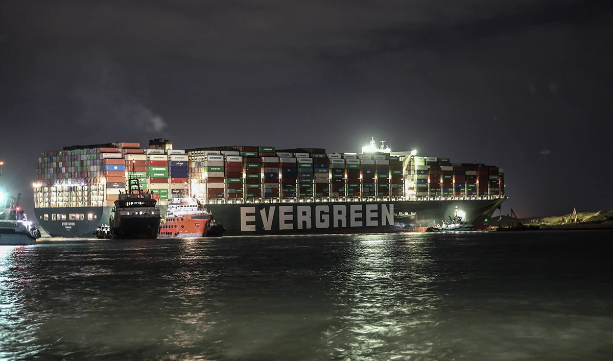 Ever Given, a Panama-flagged cargo ship, that is wedged across the Suez Canal and blocking traffic in the vital waterway is seen Saturday, March 27, 2021. (AP)