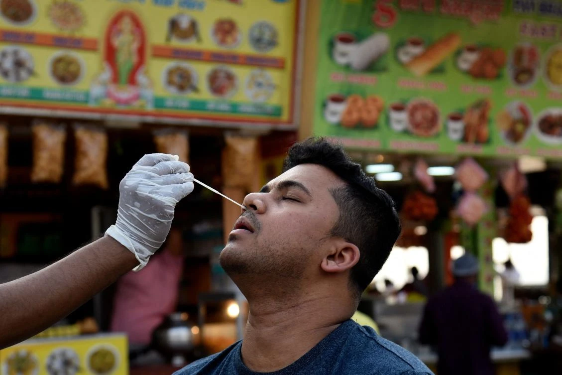 India recorded 62,714 cases of the coronavirus in the last 24 hours, the highest single-day tally since mid-October last year. (AFP)