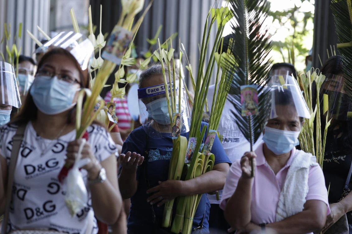 The Philippines is banning religious gatherings from Monday until Easter to comply with stricter quarantine restrictions. (AP)